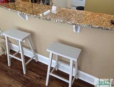 Large curved granite breakfast bar.