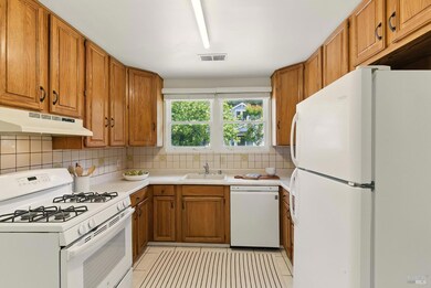 Abundant cabinets along with extra pantry
