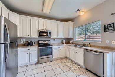 7474 S Norfolk Way, Aurora, CO 80016 - photo 6