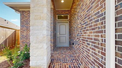 The long covered front porch is very welcoming.