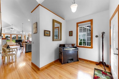 View of the entry looking towards the kitchen and living room.