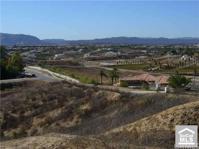 Southwest view from top of lot and corner of Sanda