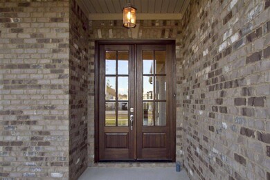 Impressive Mahogany door offers lots of natural sunlight