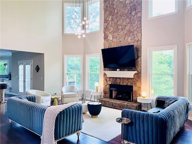 featuring plenty of natural light and a towering ceiling