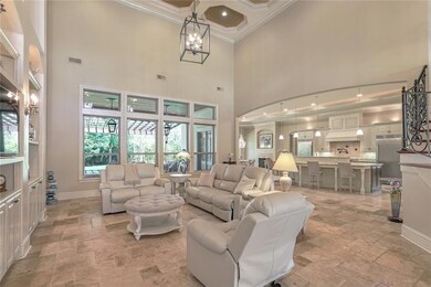 Soaring cathedral ceilings in living area. Travert