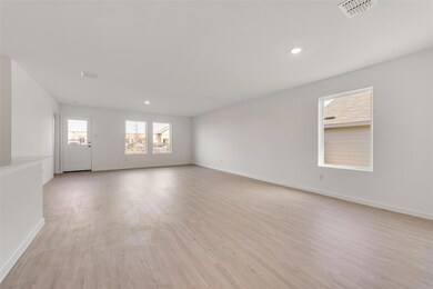 Spare room with light hardwood / wood-style floors
