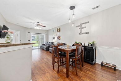 Dining room featuring dark hardwood / wood-style f
