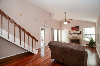 A craftsman style staircase leads up to the second