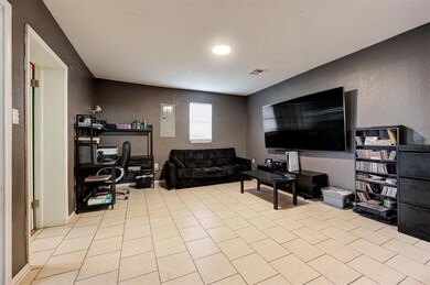 View of tiled living room
