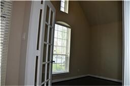 Living room or office right off the foyer with French doors.