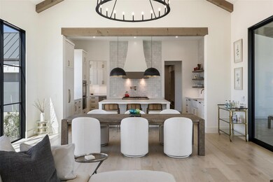 Dining area with light wood finished floors and a
