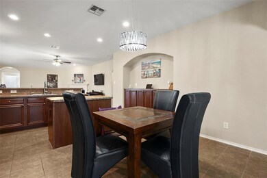Then breakfast nook features an elegant new light 