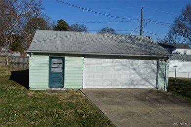 Garage with a lawn