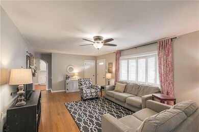 Enter the home into this cozy living room. Brand n