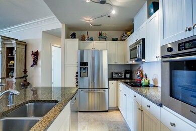 Upgraded kitchen is equipped with bead board cabin