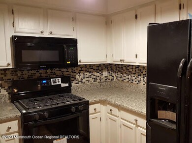 438 Indigo Ct, Morganville, NJ 07751 - photo 4