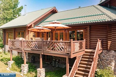 Note anodized metal roof and copper gutters