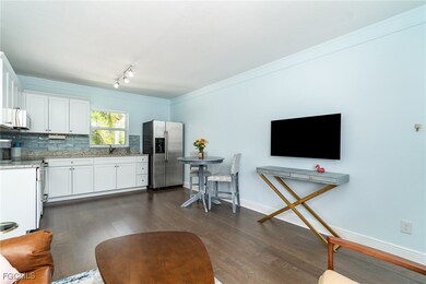 Kitchen with stainless steel appliances, LVP floor