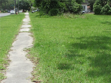 City sidewalk down the front.