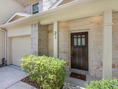 unit #21, stone+brick elevation