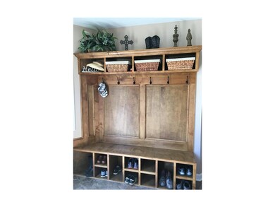 Impressive built-ins at front entry.