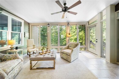 Sunroom provides tremendous views of the private b