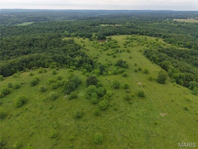 Drone / aerial view of a heavily wooded area