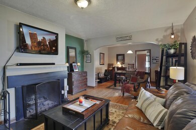 Classic archway to generous dining room