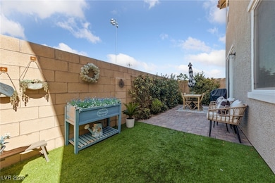 Fenced backyard featuring a patio