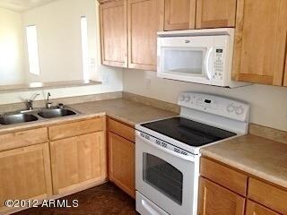 Spacious Kitchen With Upgraded Cabinets