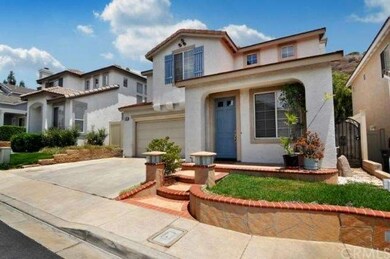 Professionally landscaped with decorative wrought 