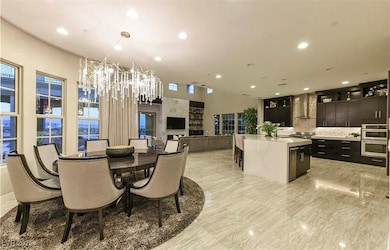 Dining room featuring a chandelier and recessed li
