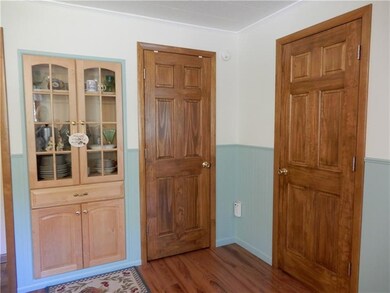 Built-in china closet in Dining Room on left.  Doo