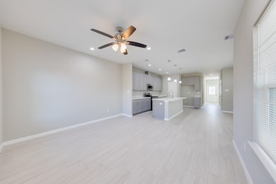 The bright and airy living room is designed to pro