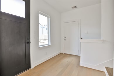 The first-floor landing leads to a versatile room