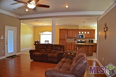 Open / airy floor plan.  Living room sports wood l
