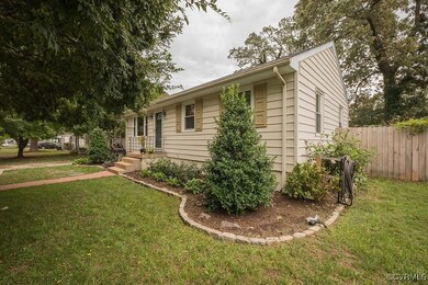 Single story home featuring a front yard
