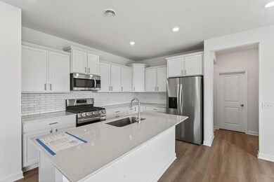 (Photo of a similar home, actual finishes may vary)