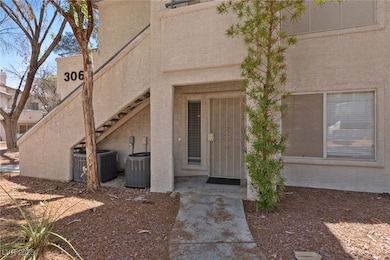 View of exterior entry featuring stucco siding