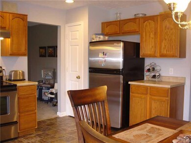 Kitchen. VIEW OF KITCHEN SHOWING THE PANTRY AND ENTRY INTO THE FORMAL DINING ROOM