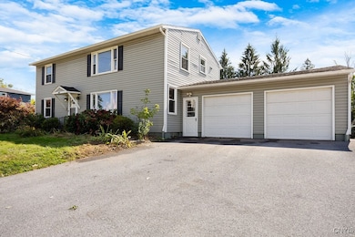 5696 Caughdenoy Rd, Clay, NY 13041 - photo 2