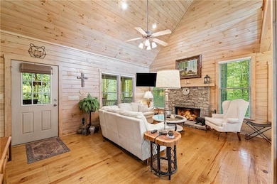 Cozy living room with soaring ceilings and stack s