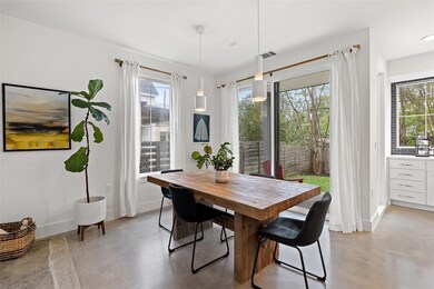 Dining room with baseboards, visible vents, and f