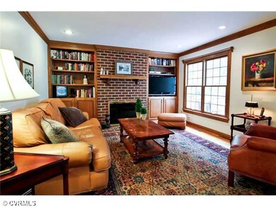 Den/Family/Great Room - Natural wood moldings with