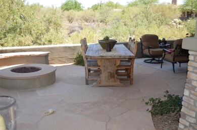 covered patio and fire pit