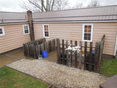 Access to lower level workshop/storage and fenced