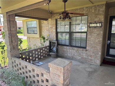 Property entrance featuring ceiling fan