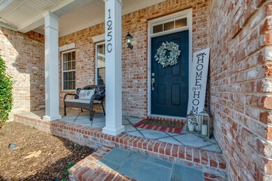 Your guests will be welcomed by the most charming covered front porch.