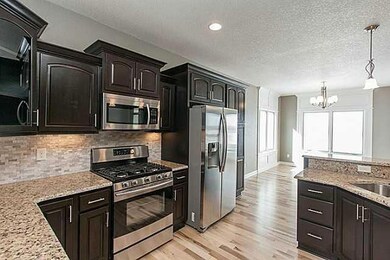 Kitchen. Granite and Stainless Appliances w/Refrig