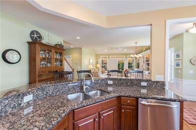 Beautiful island overlooking dining area and livin